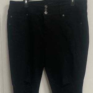 Virtually new black DISTRESSED “stiletto” jean by Torrid.